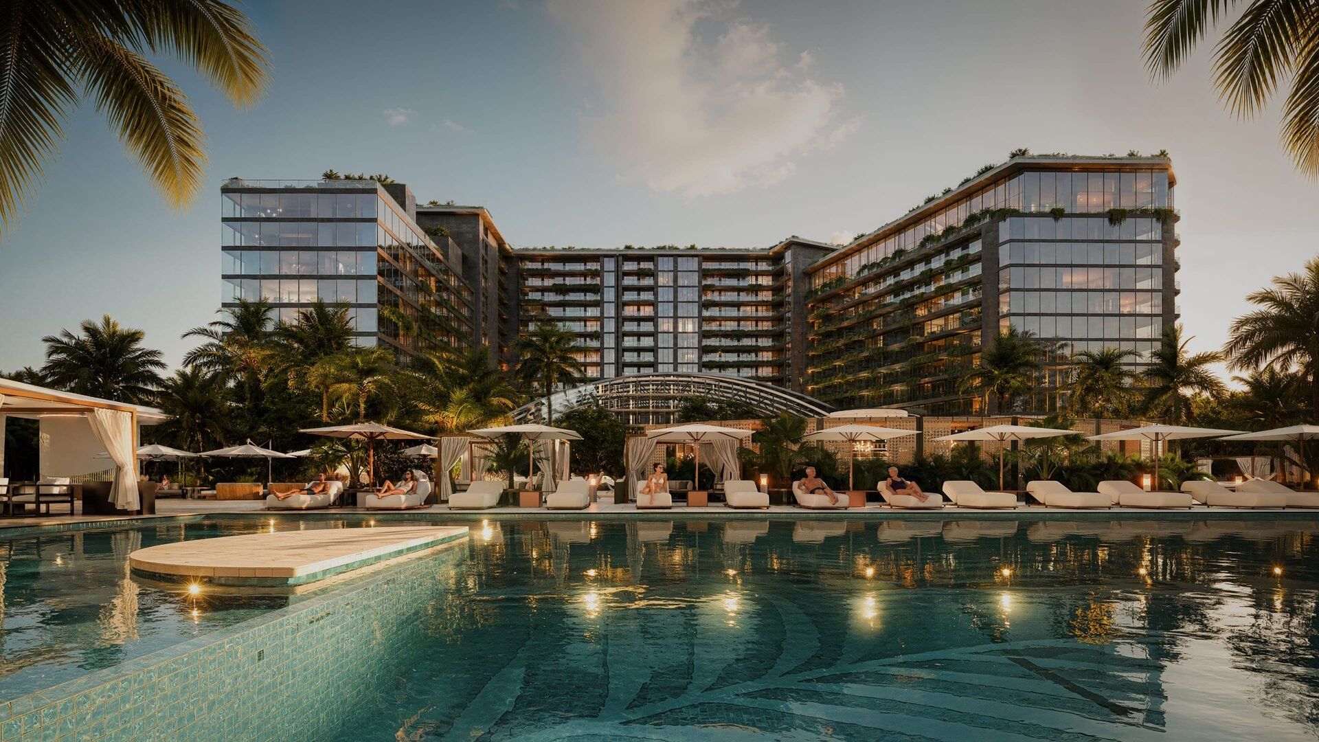 The main pool of Lagoon Resort at sunset
